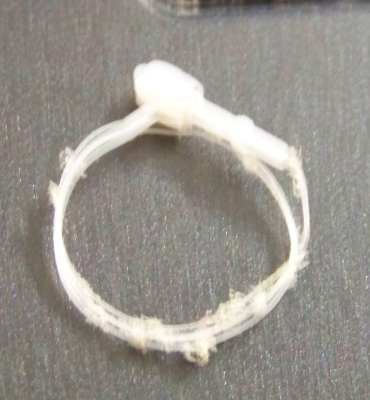 wedding rings, unusual ring, plastic tag holder